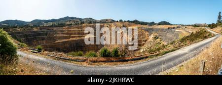 Huge mining hole at Waihi gold mine in New Zealand Stock Photo