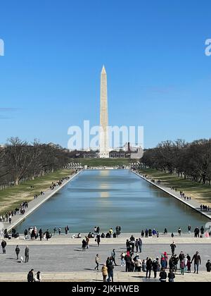 famous Washington monument under blue sky Stock Photo - Alamy