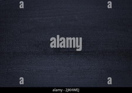 A dark black rock texture background Stock Photo