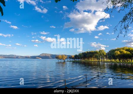 The blue sky over Dali Erhai Lake in China in spring Stock Photo