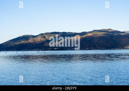 The blue sky over Dali Erhai Lake in China in spring Stock Photo