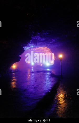 A scenic inside view of the Shuanghedong Caves with colorful lights, Wenquan, Suiyang County, Guizhou Province, China Stock Photo