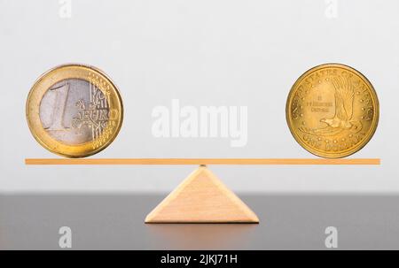 Dollar and euro in balance Stock Photo