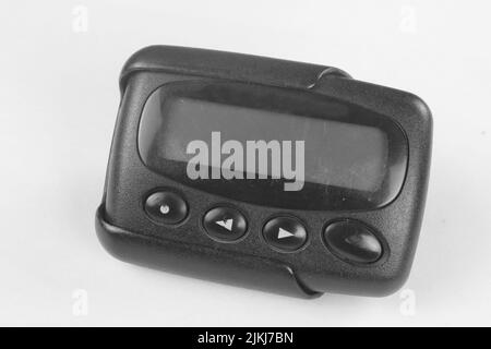 Old pager device isolate on white background Stock Photo