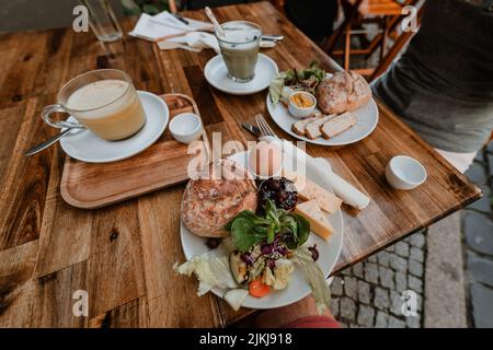 A top view of the lunch table set for two in a restaurant during daytime Stock Photo