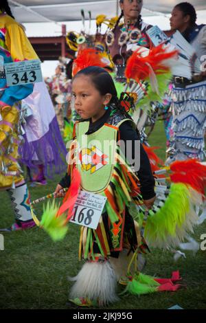 Young grass dancers in colorful regalia at the Shoshone Bannock Pow Wow, Fort Hall Idaho Stock Photo