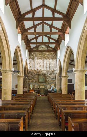 Dent, Cumbria, England, UK - 12 August 2018: The interior of the Saint Andrew Church. The church contains Norman architecture. Stock Photo