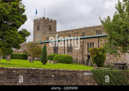 Dent, Cumbria, England, UK - 12 August 2018: View of the Saint Andrew Church. The church contains Norman architecture. Stock Photo