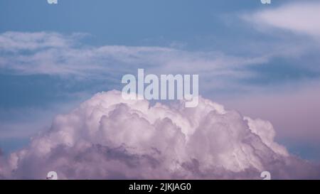 A mesmerizing cloudscape in purple-blue shades Stock Photo