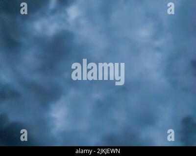 A dark abstract sky clouds background texture Stock Photo