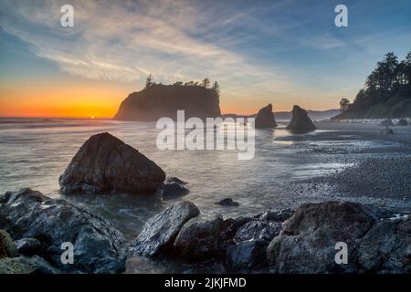 A beautiful view of the sunset from the foggy Ruby beach, Washington Stock Photo