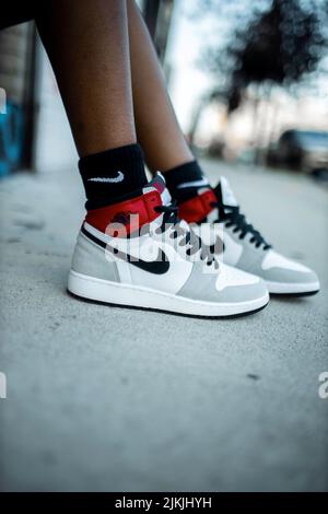 Woman wearing nike shoes hi-res stock photography and images - Alamy