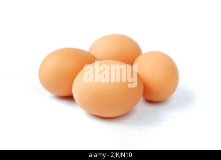 Chicken eggs isolated on a white background Stock Photo