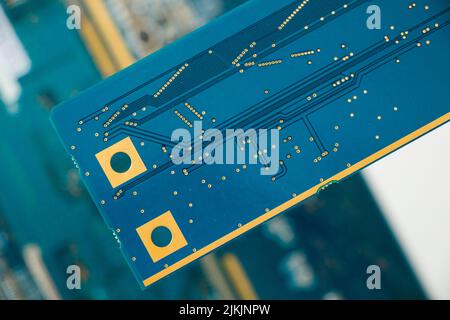 Electronic motherboard and isometric processor and microchip, Ukraine and Russian war theme Stock Photo