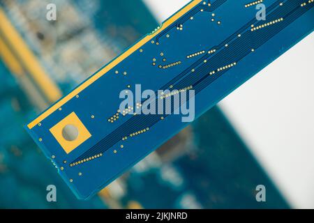 Electronic motherboard and isometric processor and microchip, Ukraine and Russian war theme Stock Photo