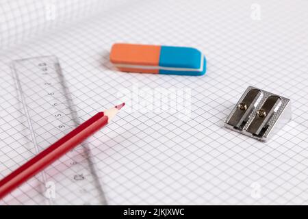 school equipment ruler, eraser with checkered paper Stock Photo