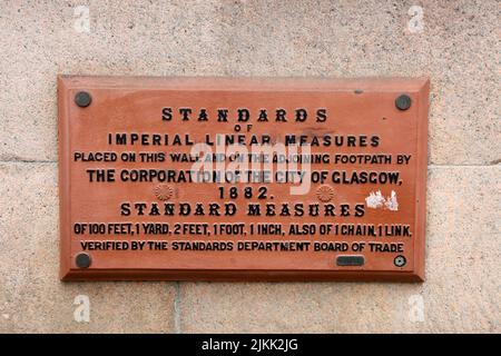 City Chambers, George Square,Glasgow., Scotland UK. Glasgow Standard Measures on wall of city chambers. An usual feature on the building. Sign reads standard of Imperial Linear Measure, Place on the wall and a joining footpath by corporation of City of Glasgow 1882