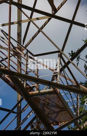 A Rusted iron railing and steps on an old forest service fire tower Stock Photo