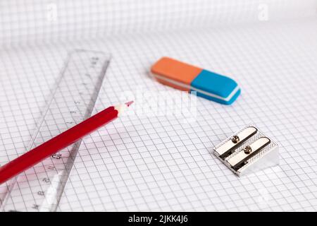 school equipment ruler, eraser with checkered paper Stock Photo