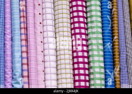 The colorful bolts of fabric for making shirts by a tailor Stock Photo