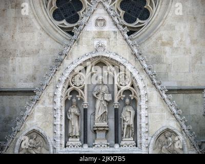 A gable triangle with a statue of Christ above the main entrance of the Zagreb Cathedral in Croatia Stock Photo