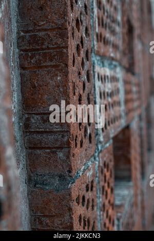 A selective focus shot of bricks in the all during the construction Stock Photo