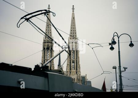 A low angle shot of beautiful buildings in Votivkirche, Vienna Stock Photo
