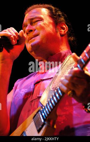 A vertical shot of actor and musician Steven Seagal performing live at the El Rey Theater Stock Photo