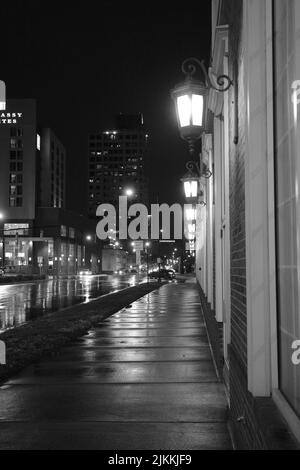 A vertical grayscale shot of the night city, Charlotte, North Carolina, USA Stock Photo