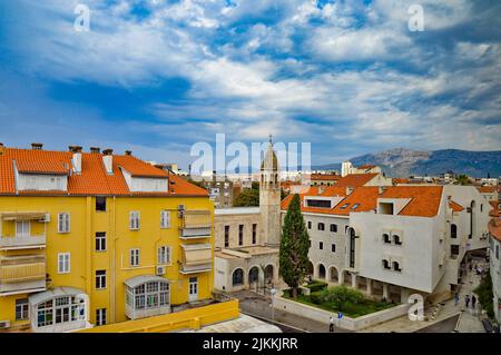 The beautiful cityscape of Split in Croatia against a blue cloudy sky Stock Photo