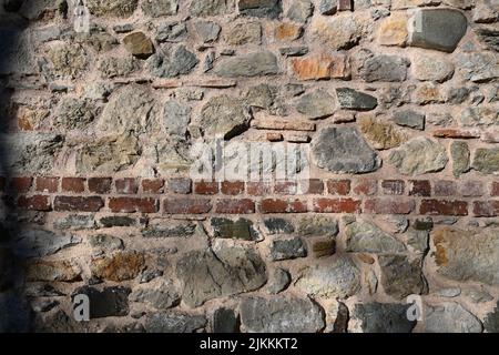 A background of a stone wall in different colors in Istanbul, Turkey Stock Photo