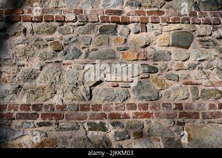 A background of a stone wall in different colors in Istanbul, Turkey Stock Photo