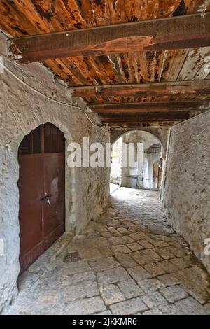 A vertical shot of a narrow street in the medieval village of Pietramelara in the province of Caserta Stock Photo