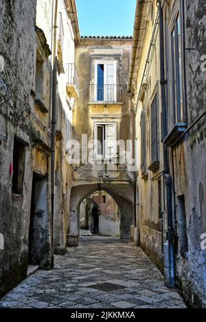 A vertical shot of a narrow street in the medieval village of Pietramelara in the province of Caserta Stock Photo