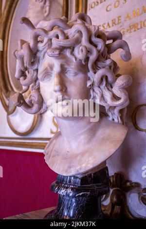 Medusa Head Bust Sculpture Statue by Gian Lorenzo Bernini. Rome Italy. Perseus holding a snake haired gorgon head is another sculpture by caravaggio. Stock Photo