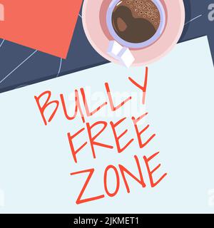Writing displaying text Bully Free Zone. Business approach Be respectful to other bullying is not allowed here offee cup sitting on desk with notebook Stock Photo