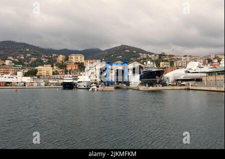 Line of small outboard motor fishing boats at dock at the New