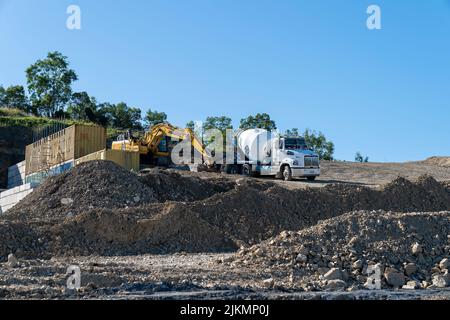 Mackay, Queensland, Australia - 7th June 2022: Machinery working in a quarry producing industrial rock and stone for construction of roads and other p Stock Photo