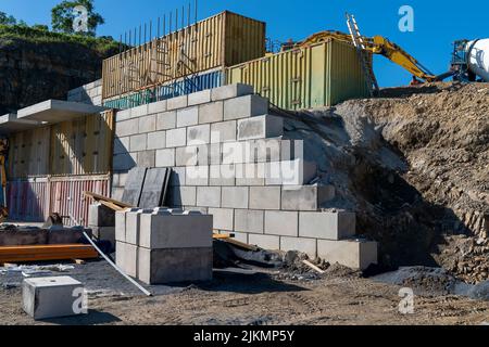 Mackay, Queensland, Australia - 7th June 2022: Infrastructure and the machinery working in a quarry producing industrial rock and stone for constructi Stock Photo