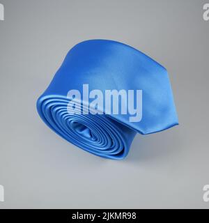 A closeup shot of rolled necktie isolated on white background Stock Photo