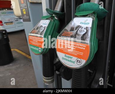 Petrol, Diesel fuel pumps, unleaded, super-unleaded,, at filling station, Sainsburys Warrington, town centre, Cheshire, England, UK Stock Photo