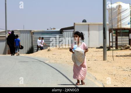 Zaatari. 2nd Aug, 2022. A Syrian refugee is seen at Zaatari refugee camp in Jordan, on Aug. 2, 2022. Credit: Mohammad Abu Ghosh/Xinhua/Alamy Live News Stock Photo