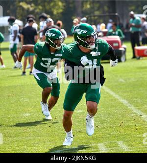 Florham Park, New Jersey, USA. August 2, 2022, Florham Park, New Jersey, USA: New York Jets' safetyÕs Ashlyn Davis (21) and Elijah Riley (33) run a defense drill during Jets training camp at the Atlantic Health Jets Training Center, Florham Park, New Jersey. Duncan Williams/CSM Credit: Cal Sport Media/Alamy Live News Stock Photo