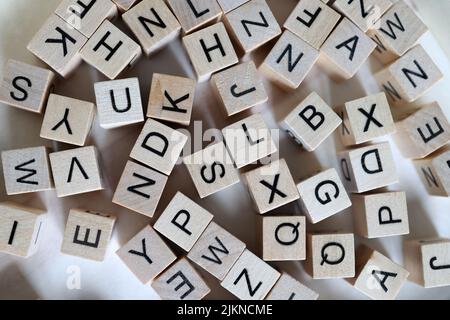 Background of wooden cubes with letters for learning the alphabet. Stock Photo