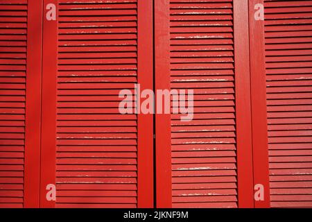 A beautiful wooden red painted vintage door texture Stock Photo