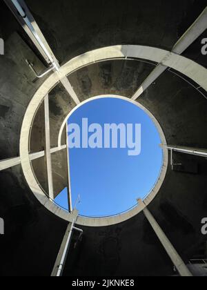 A vertical low angle shot of a Bernoulli spiral staircase Stock Photo