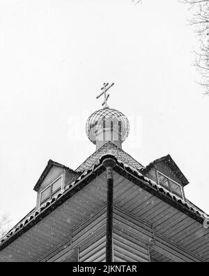 Low angle grayscale shot of a church with a cross on top Stock Photo ...