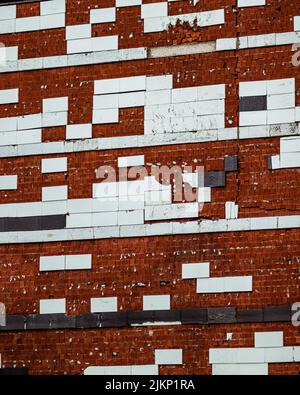 A brick wall with colorful tiles on the building in Istanbul Stock Photo