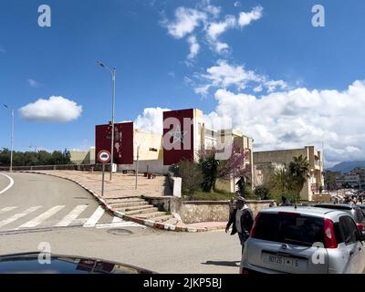 Moroccan flag painted on a residential building's wall in Morocco Stock Photo