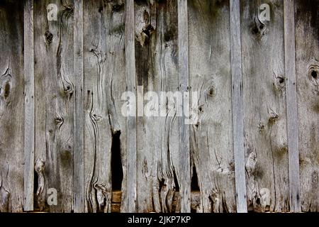 Old weathered rough plank wood texture background Stock Photo